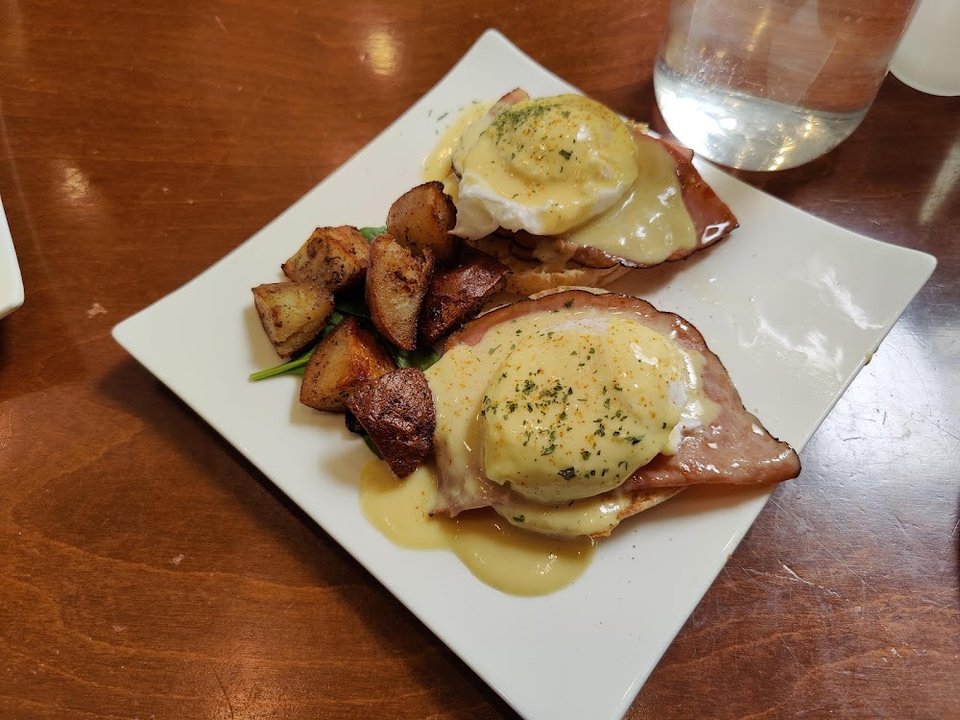 Varied menu with brunch, burgers, and sides.